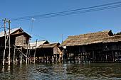 Inle Lake Myanmar. All the buildings are constructed on piles. Residents travel around by canoe, but there are also bamboo walkways and bridges over the canals, monasteries and stupas. 